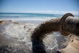 marine-pollution-sewage-pipe-draining-in-ocean-in-la